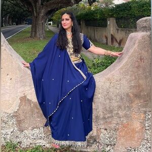Elegant Blue Embellished Lehengas set with accessories.
